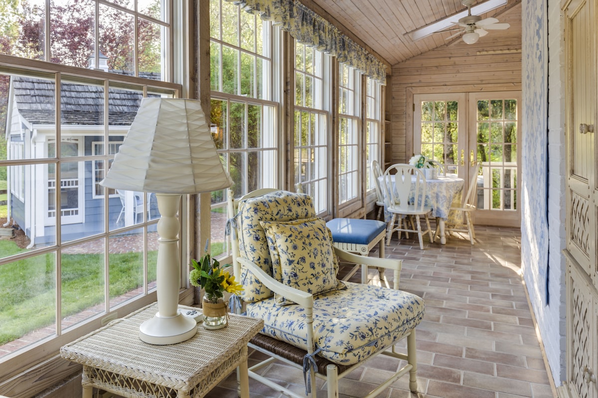 Cosy conservatory corner with armchair, comfortable in any season